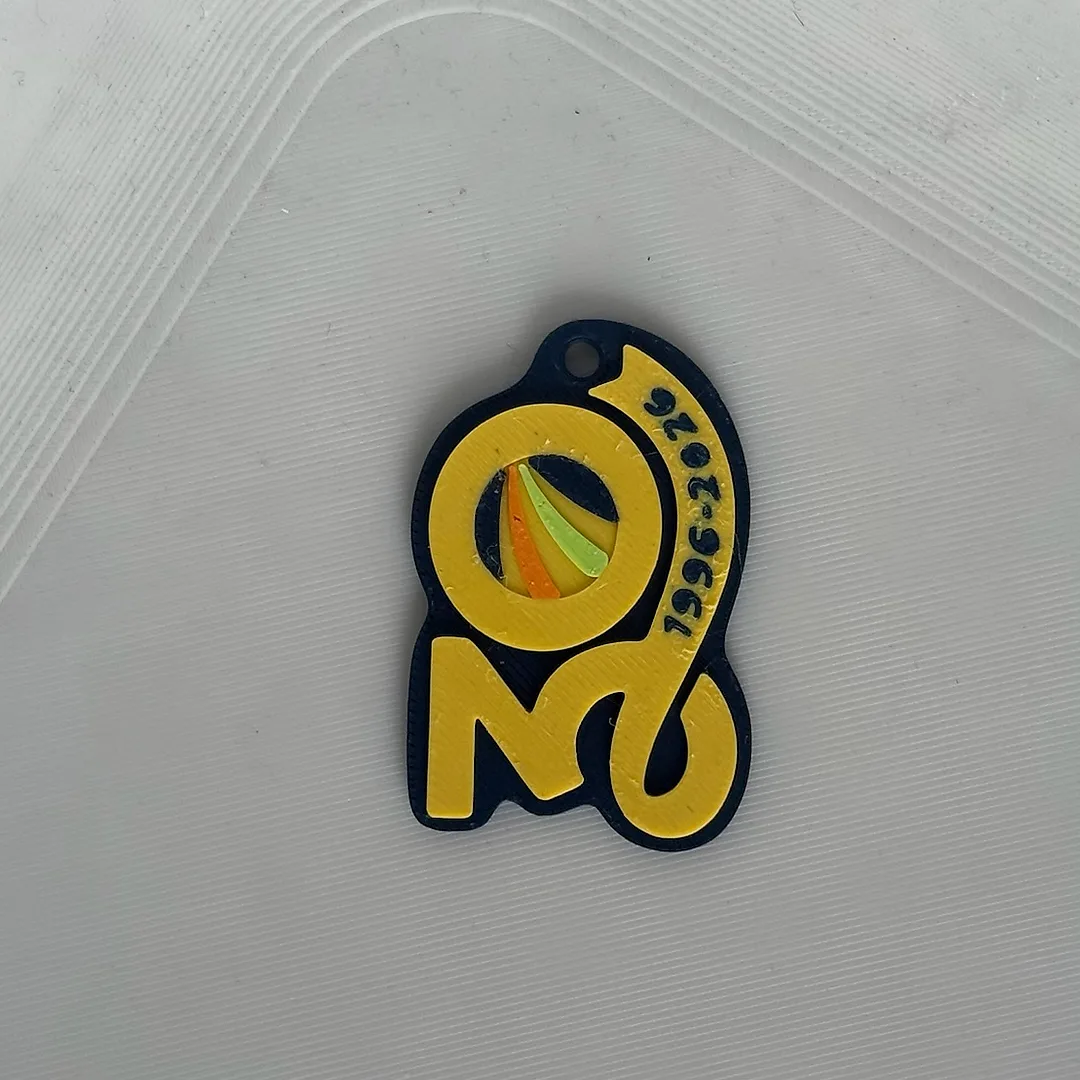 Porte-clé au logo 30 ans 1996-2026